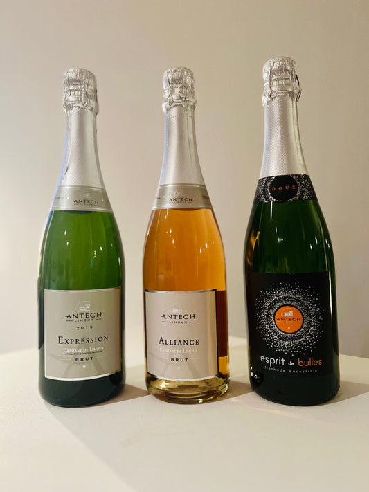 Three bottles of Crémant de Limoux from Antech: Expression Brut, Alliance Rosé Brut, and Esprit de Bulles Doux. A sparkling wine selection perfect for festive celebrations and gifting.